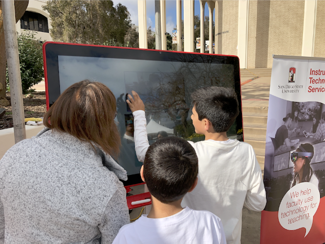 k-12 students testing smartboard